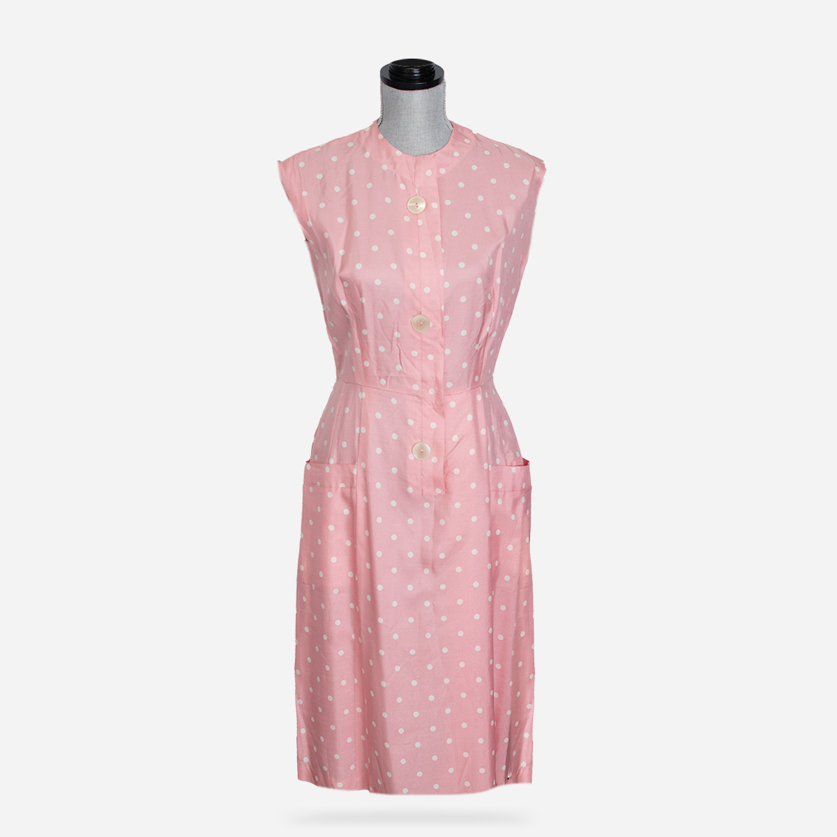 vintage 1950s pink polka dot sleeveless dress with pockets