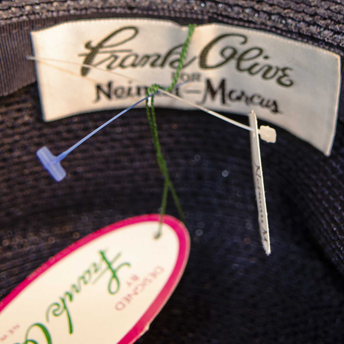 Frank olive hat label