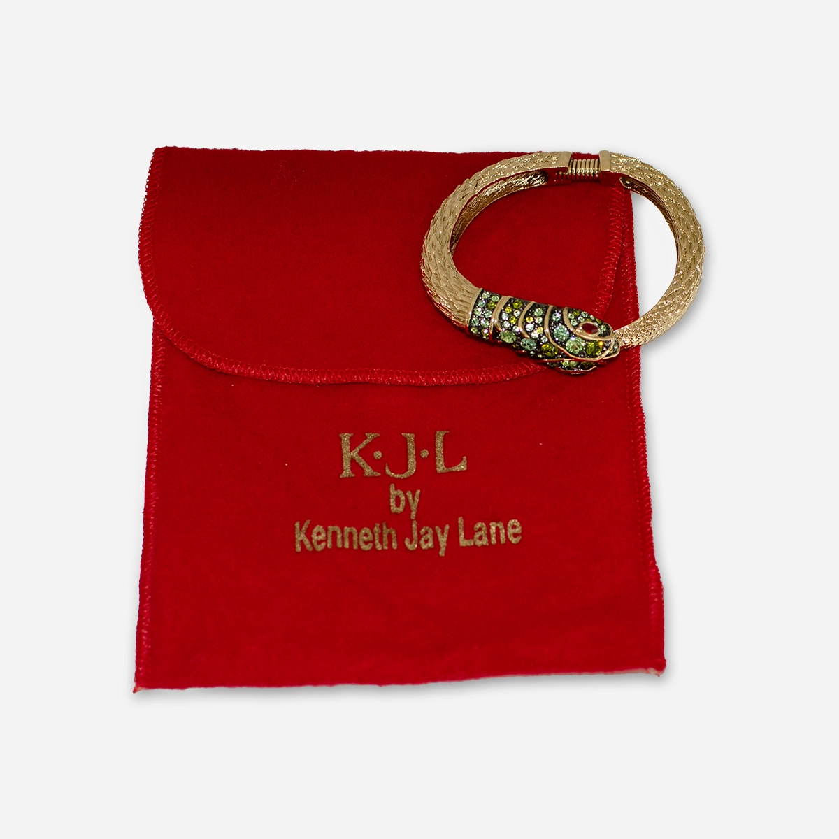 KJL Snake bracelet with red pouch