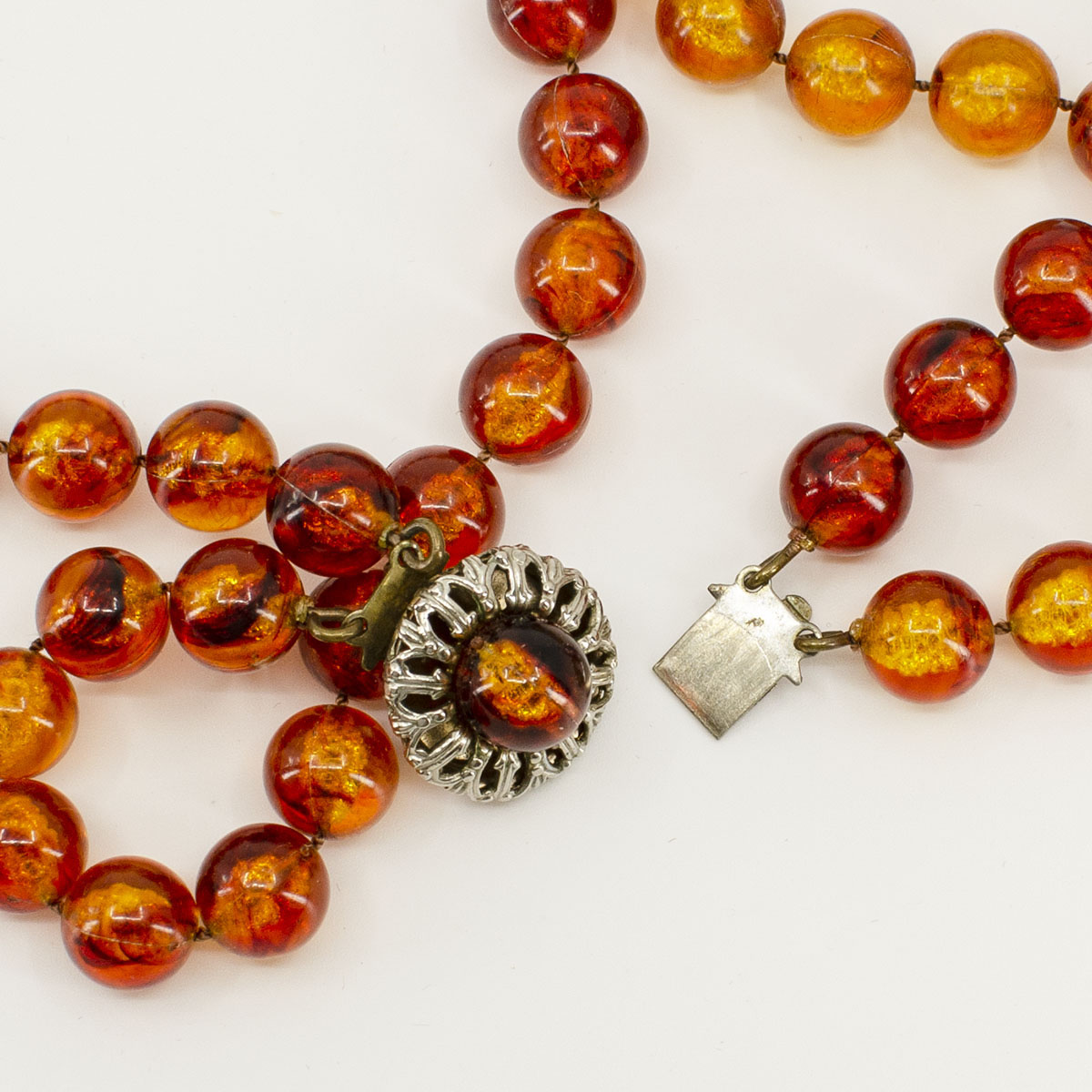 tab closure amber bead necklace
