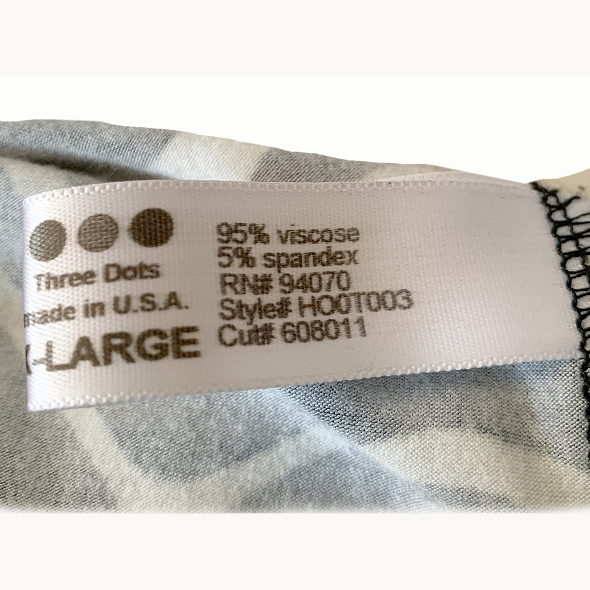 three dots clothing label