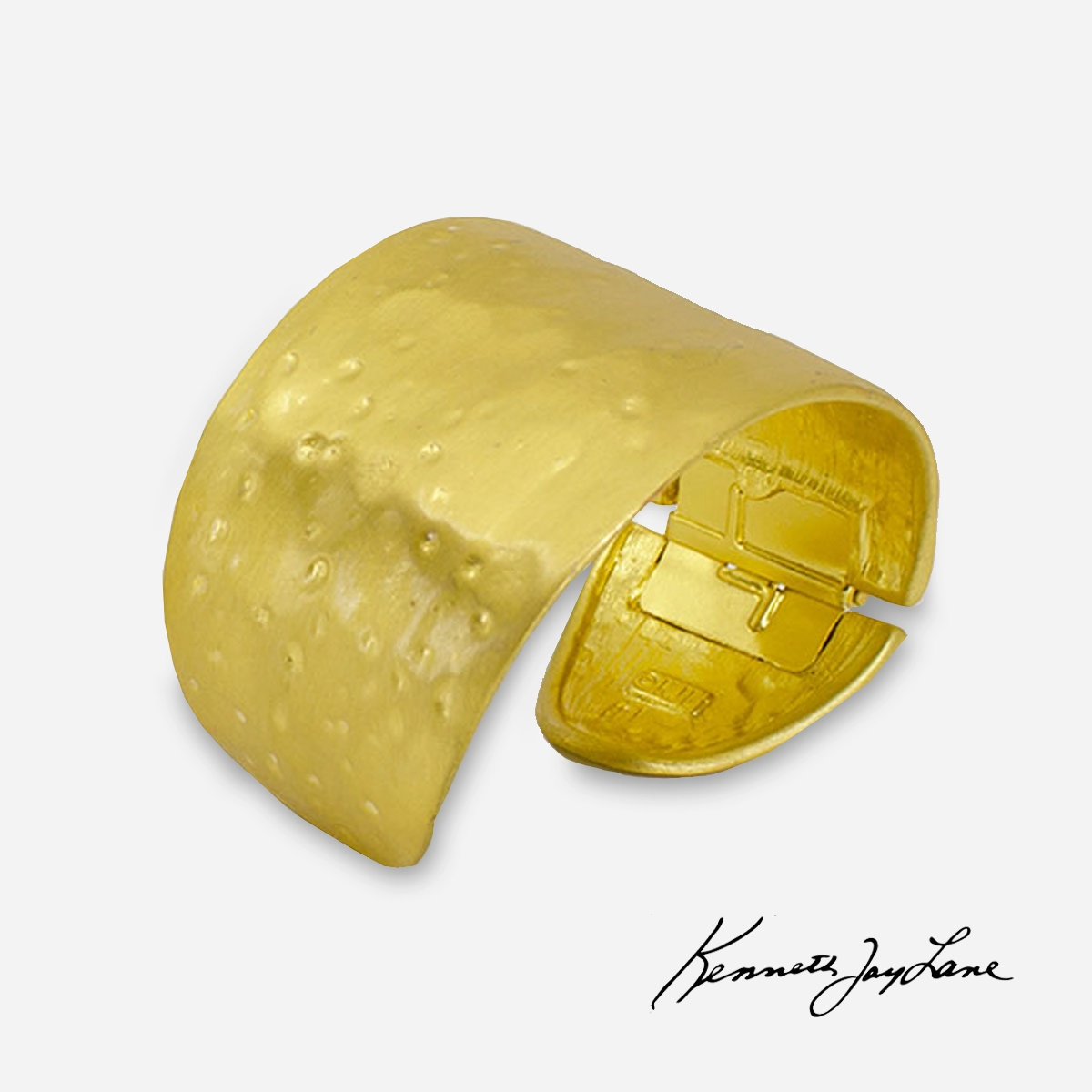 Kenneth Jay Lane Hammered gold cuff bracelet signed Kenneth Jay Lane Hammered gold cuff bracelet