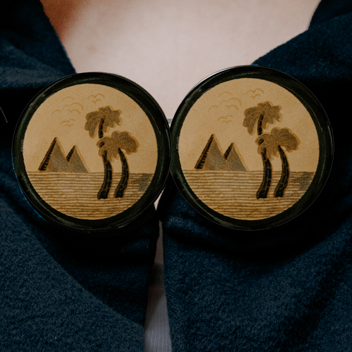 large 1920s celluloid buttons with palm trees and pyramid