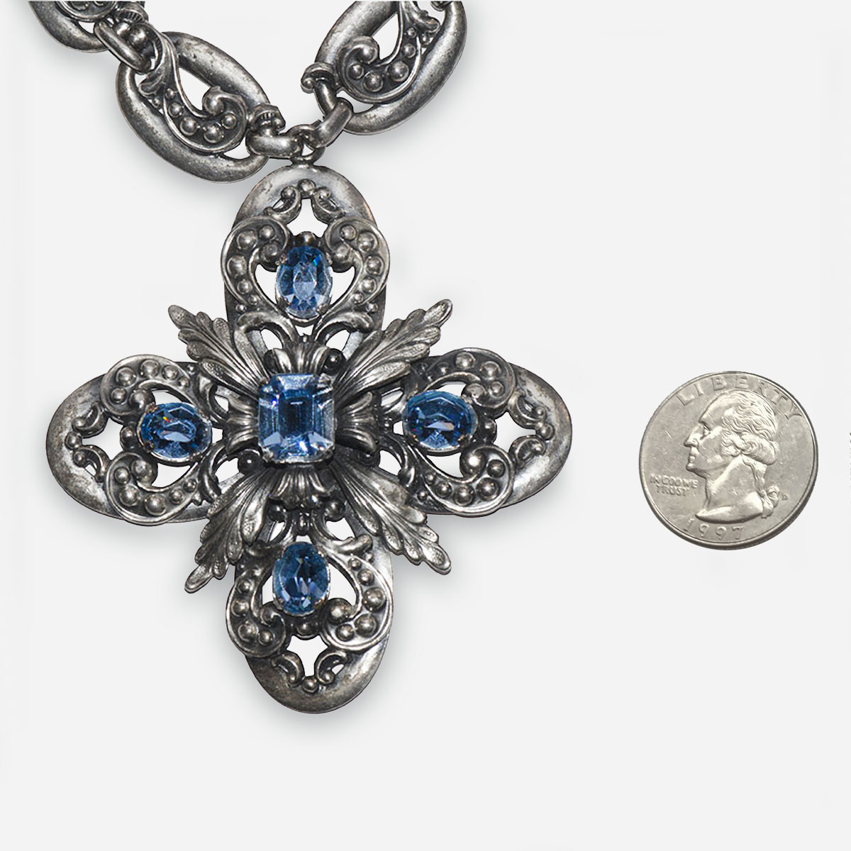 blue maltese cross pendant