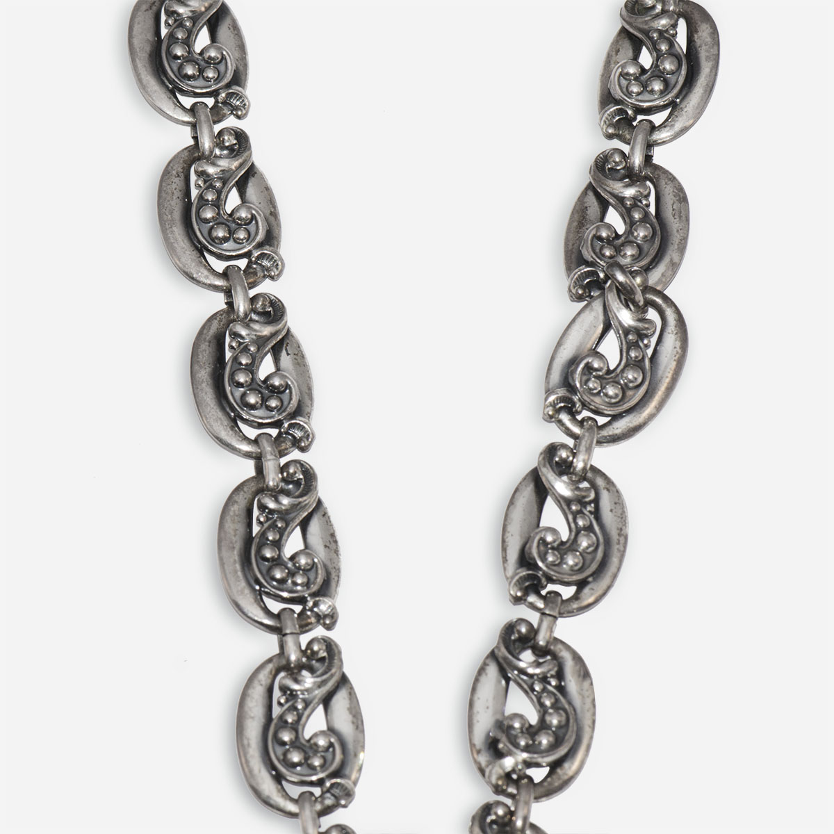 metal scrollwork necklace