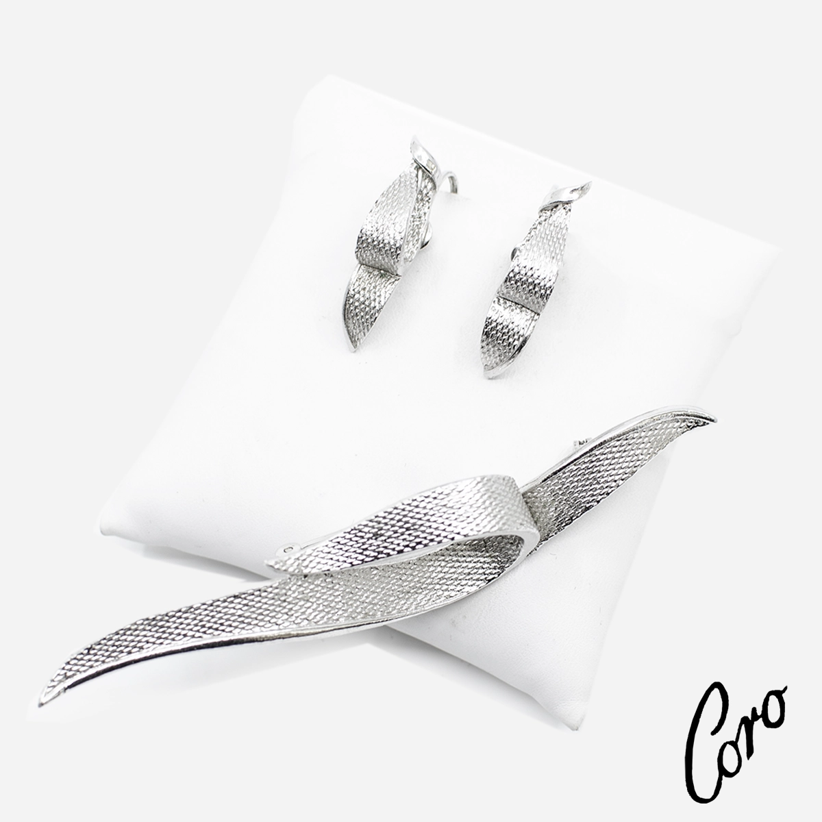 Coro logo silver jewelry set