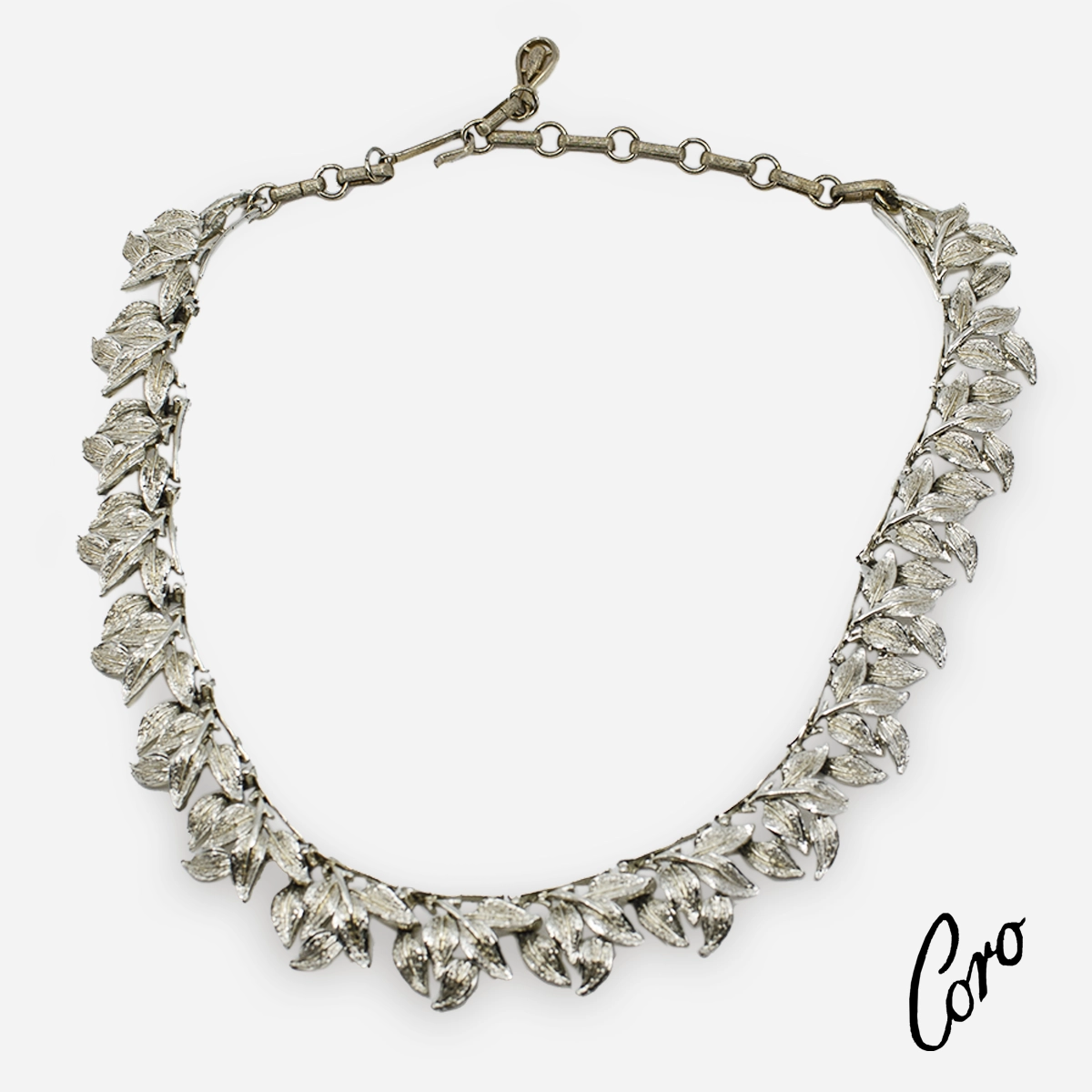 Coro logo silver leaf necklace