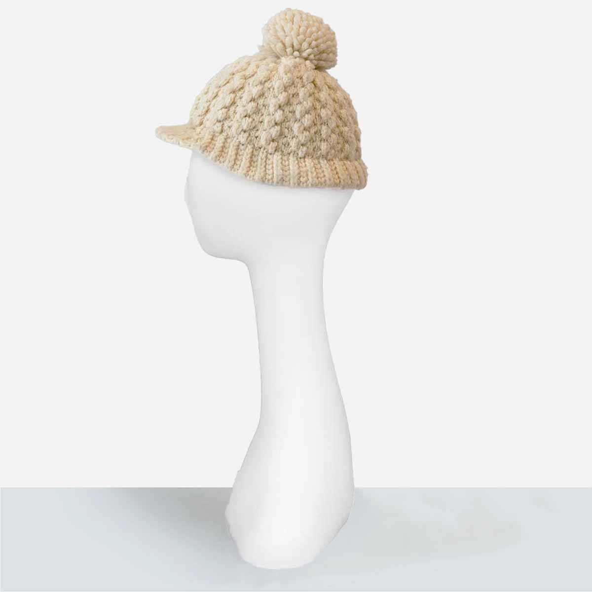 cream knit cap with brim