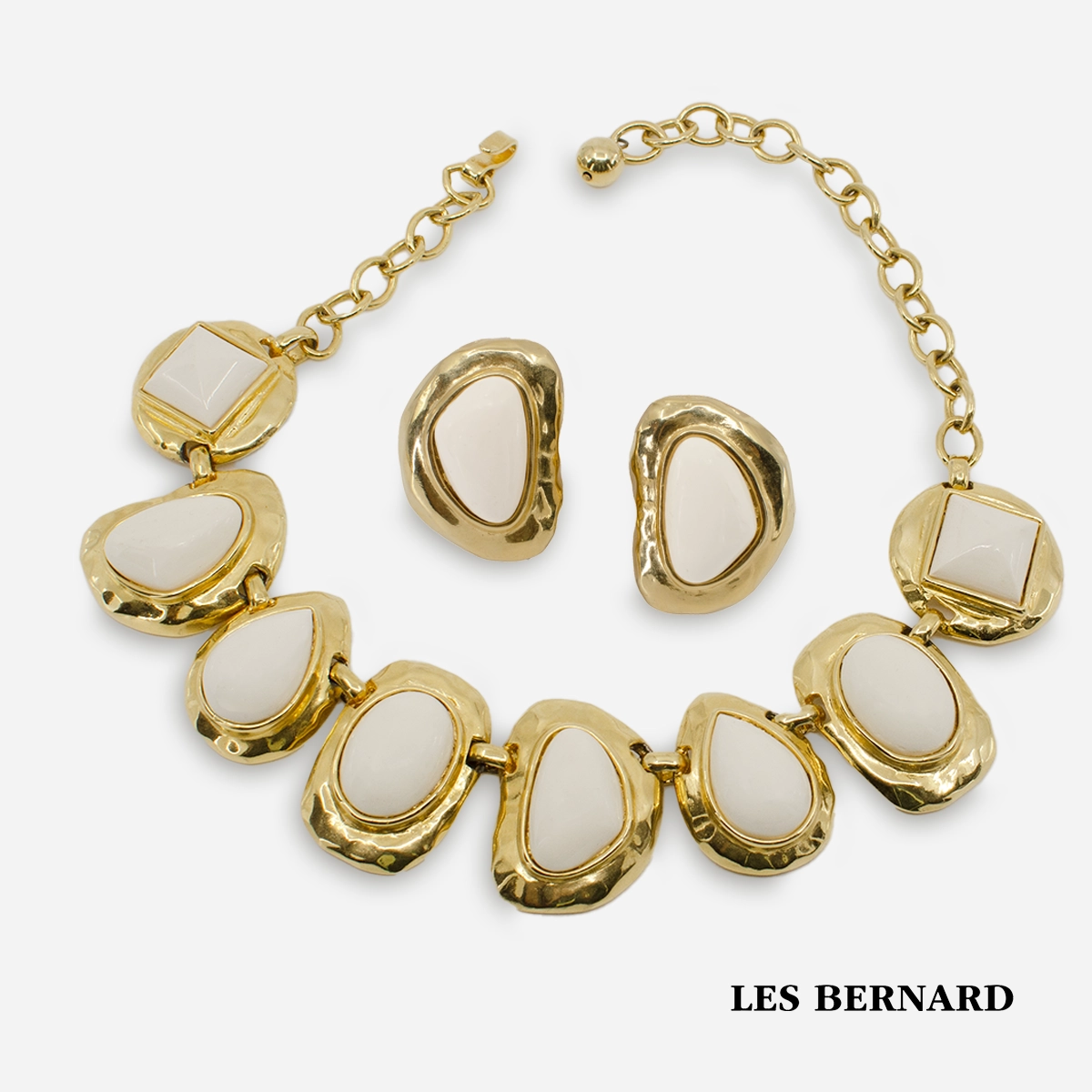 signed les bernard jewelry set white and gold