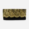 1990s black and gold clutch black clutch with gold lace
