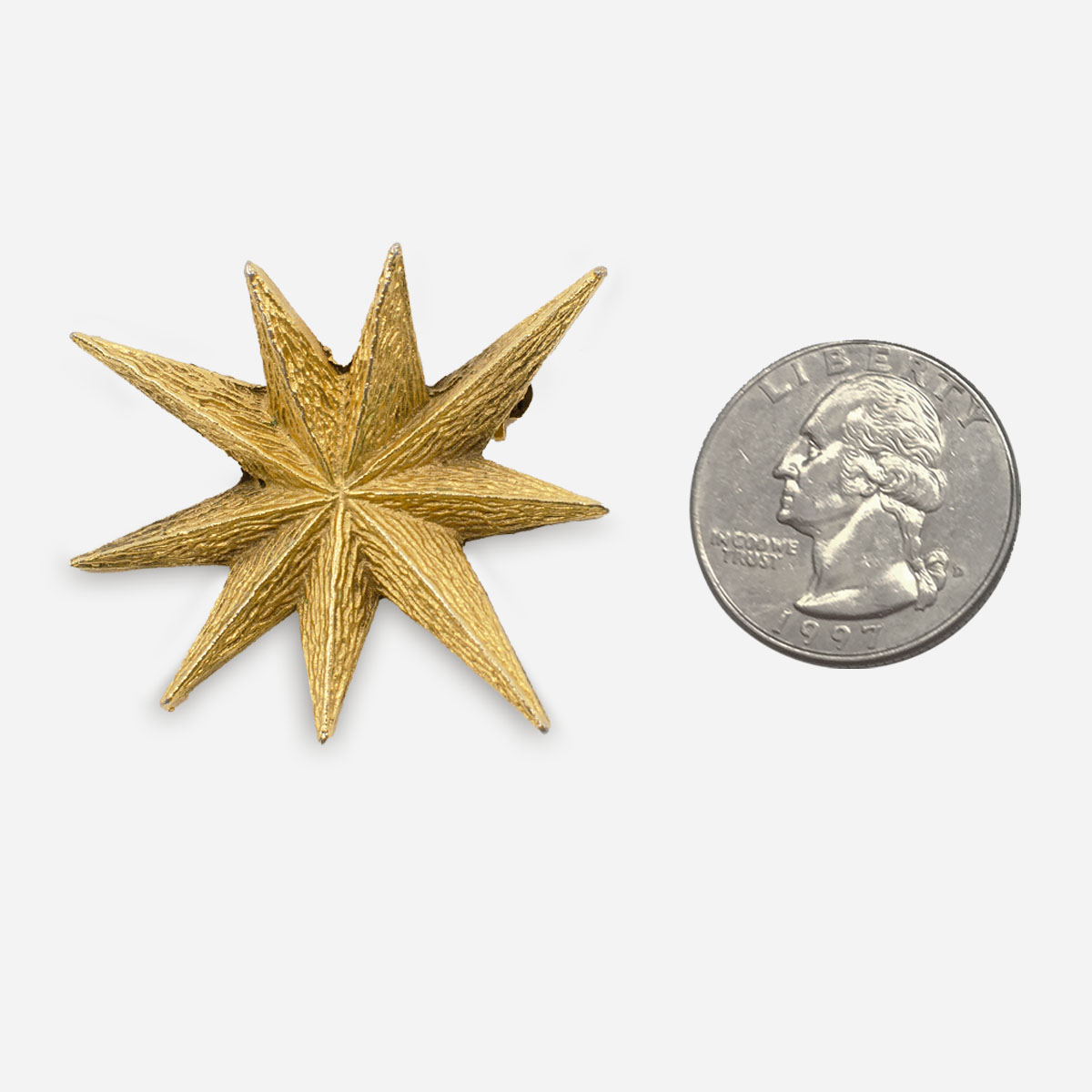 small gold star brooch