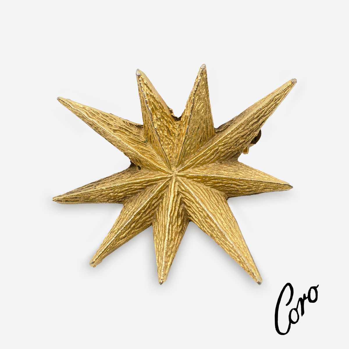 coro logo star pin