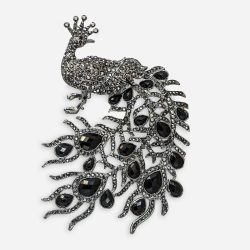 Massive peacock brooch