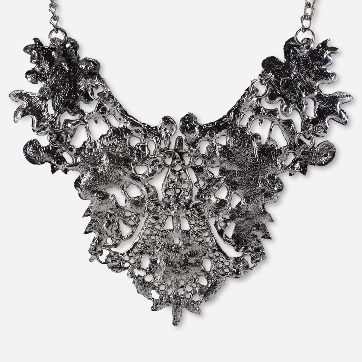 silver back of vintage bib necklace