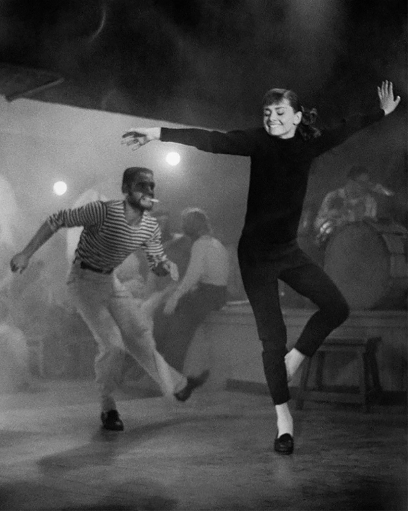 Audrey Hepburn in black pedal pushers in Funny Face