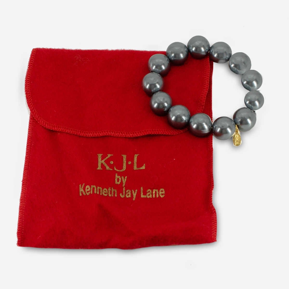 KJL Beaded bracelet with red logo pouch