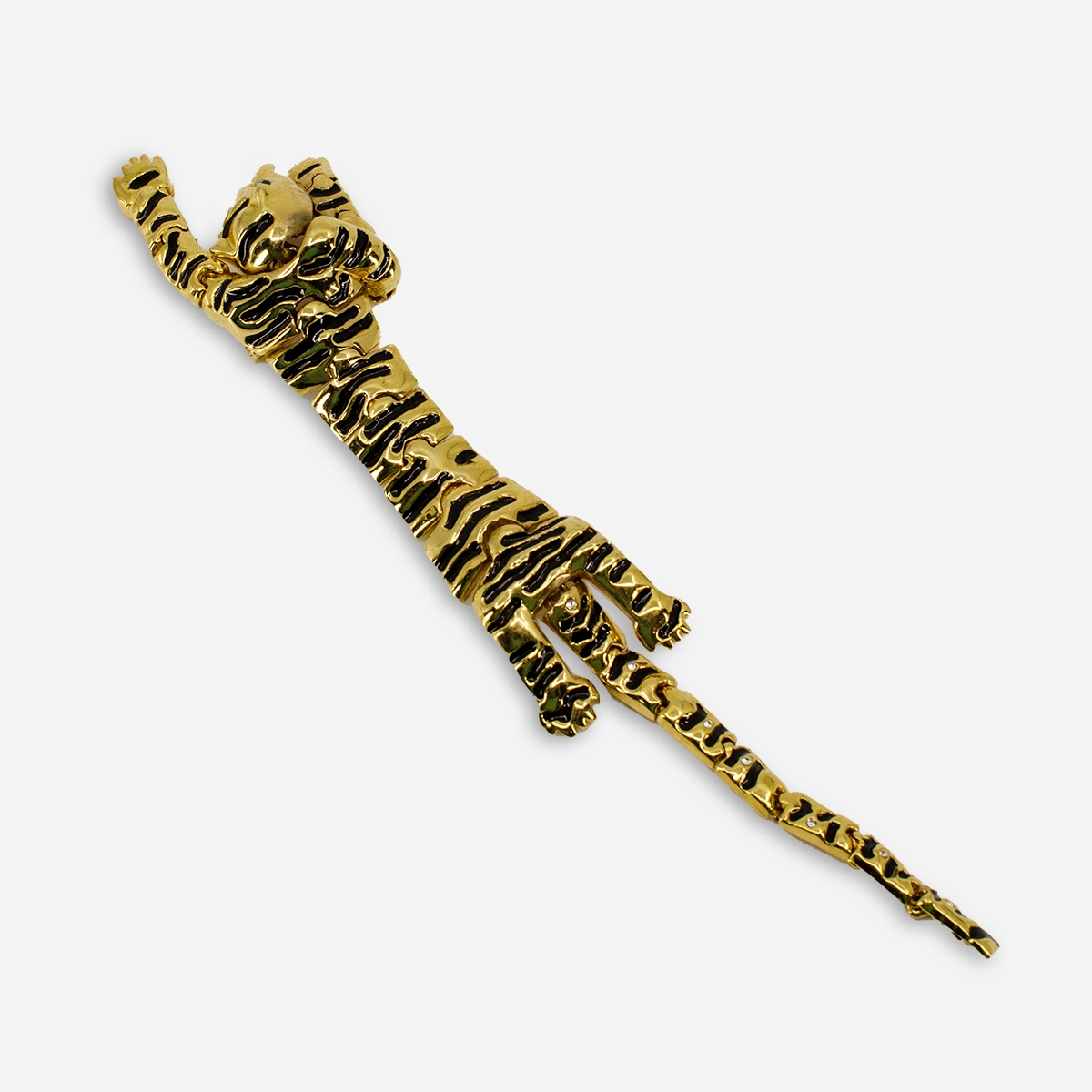 gold and black enamel tiger shoulder brooch