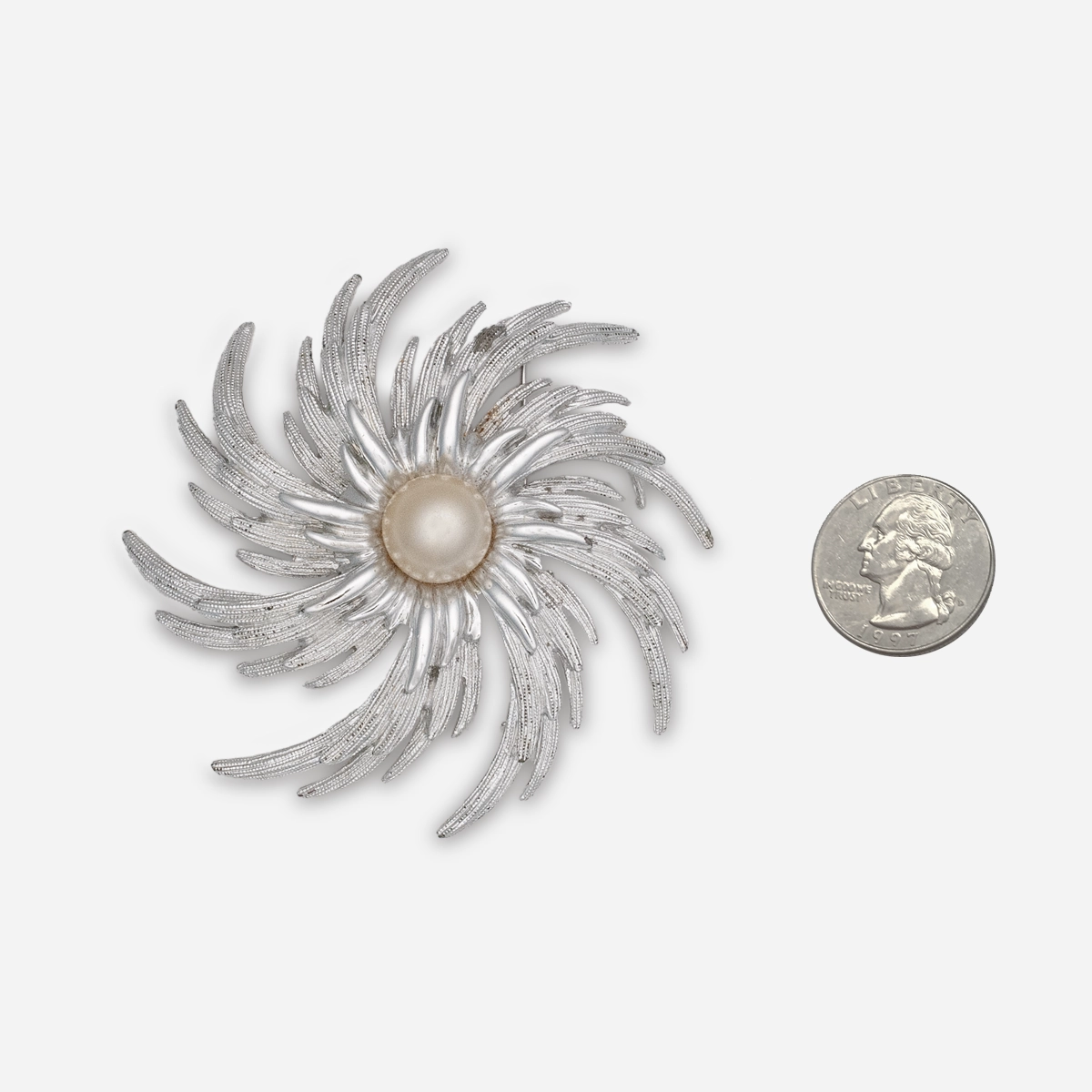 Sarah Coventry Silver pinwheel brooch