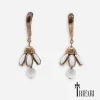 Trifari white milk glass dangle earrings Trifari white milk glass dangle earrings