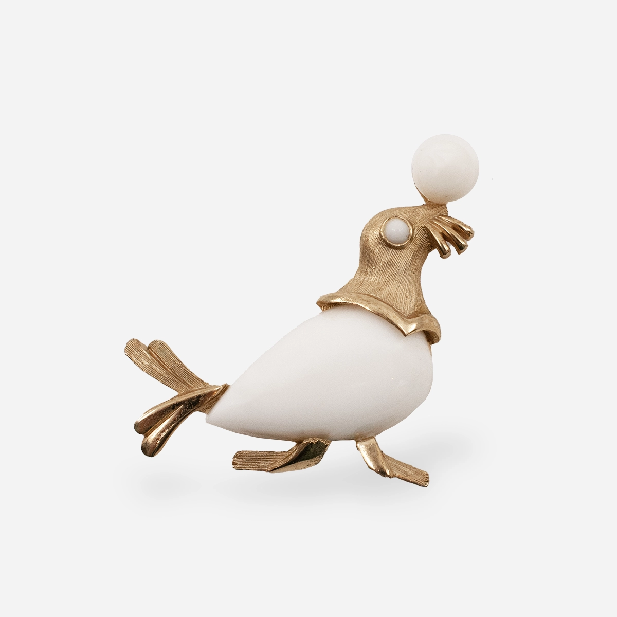 1960s Trifari milk glass seal brooch balancing ball