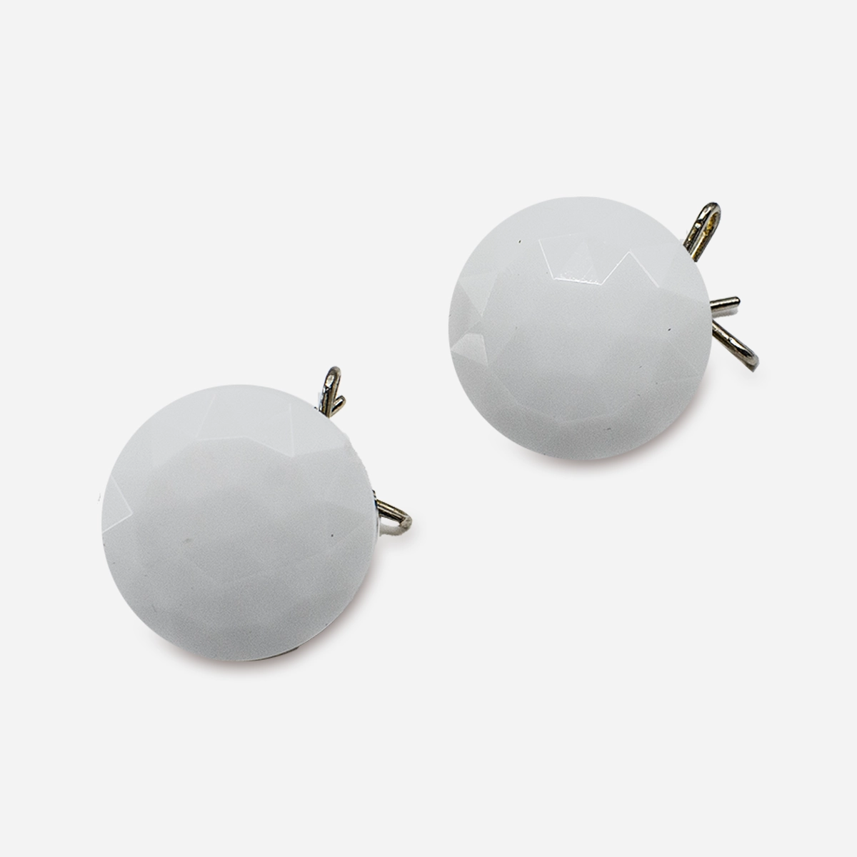 Pair of vintage white faceted glass button earrings with gold hardware.