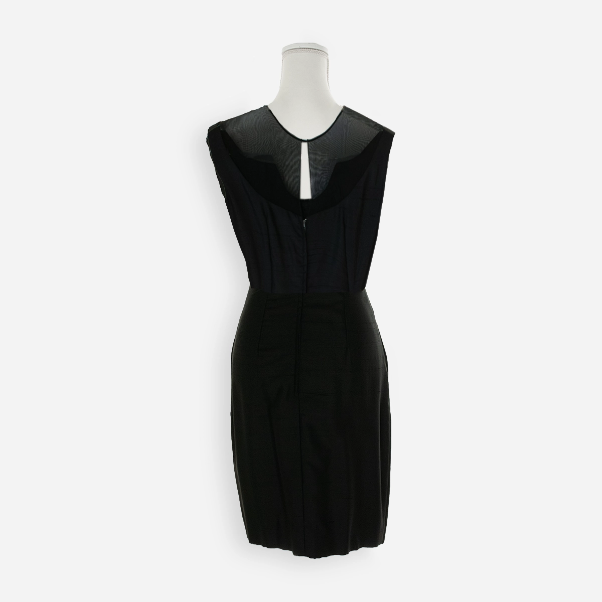 Back view: Back of 1960s black cocktail dress showing sheer illusion panel and keyhole opening