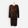 Front view of the Steve Fabrikant brown knit skirt suit on mannequin showing abstract black inserts and gold stud details.