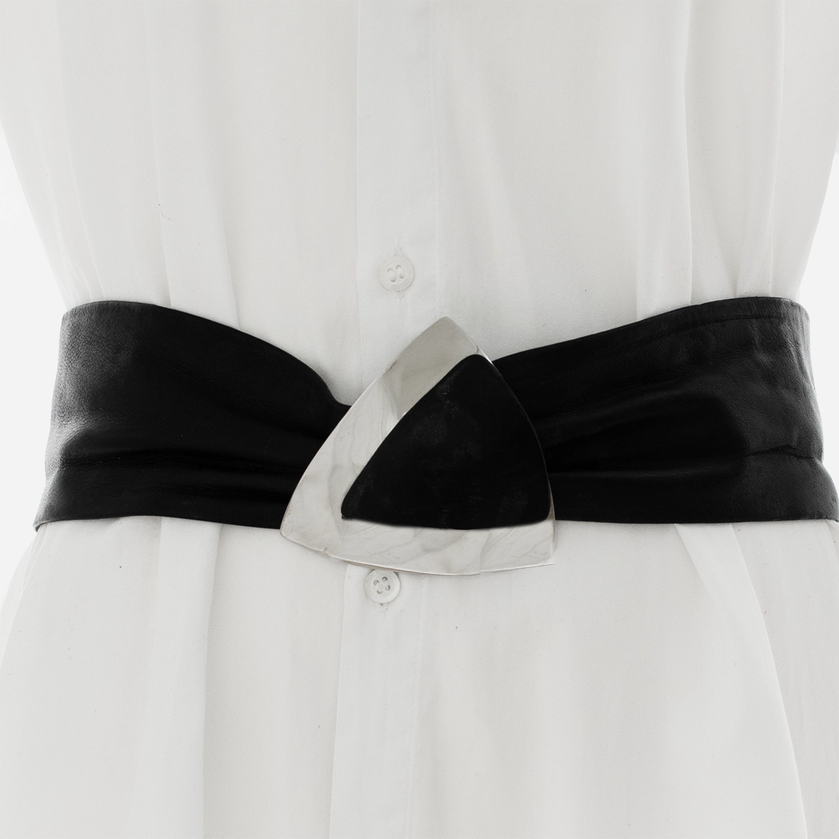 closeup on black belt on white shirt