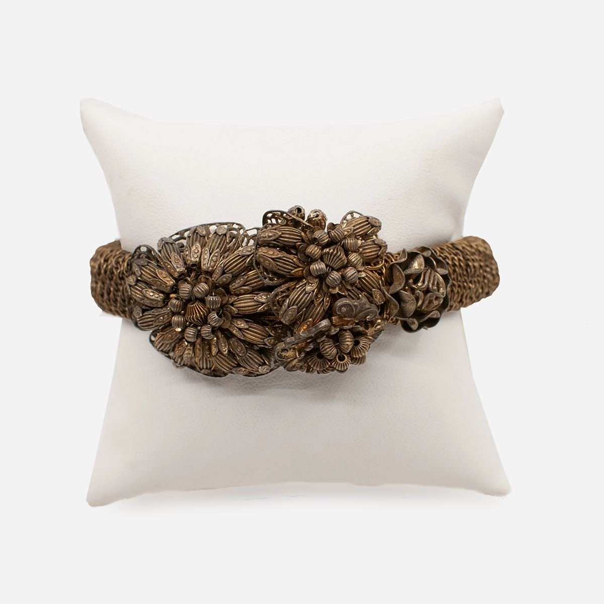 Miriam Haskell 1950s brass floral wrap bracelet with bead and wire construction.