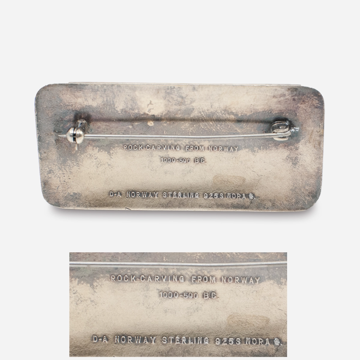 Back of David Andersen sterling silver brooch showing rock carving inscription. Close-up of D-A Norway Sterling 925S Nora Gulbrandsen hallmark on enamel brooch.