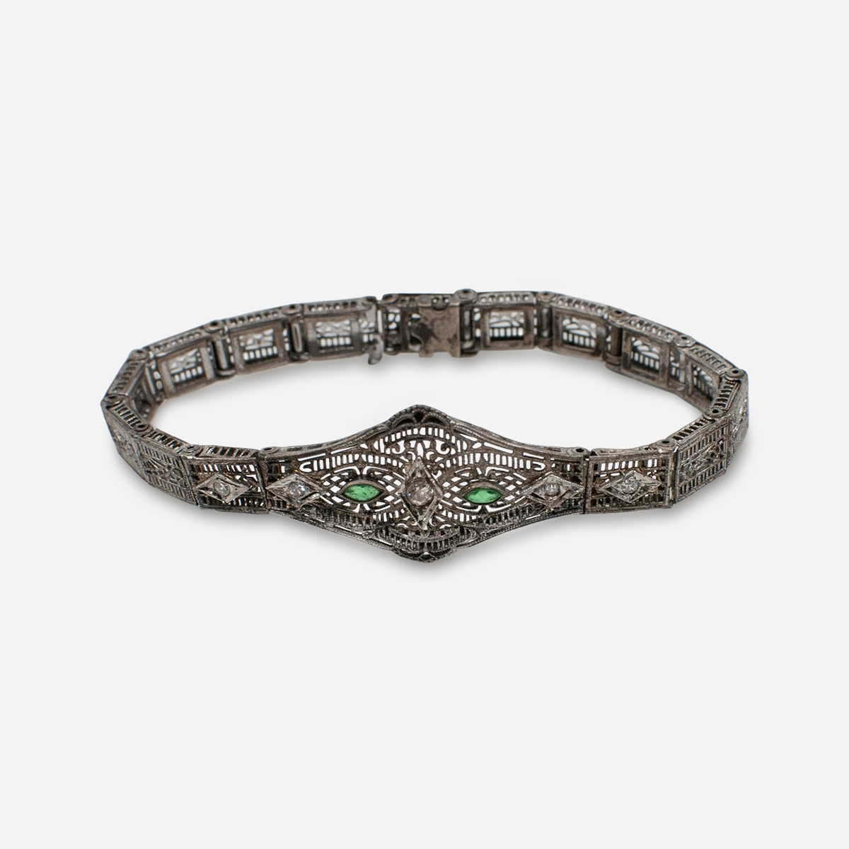 SIlver Edwardian bracelet Antique Edwardian silver filigree bracelet with emerald and clear paste stones