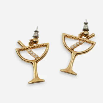 Pair of goldtone martini-glass earrings with faux pearl swizzle sticks on white background