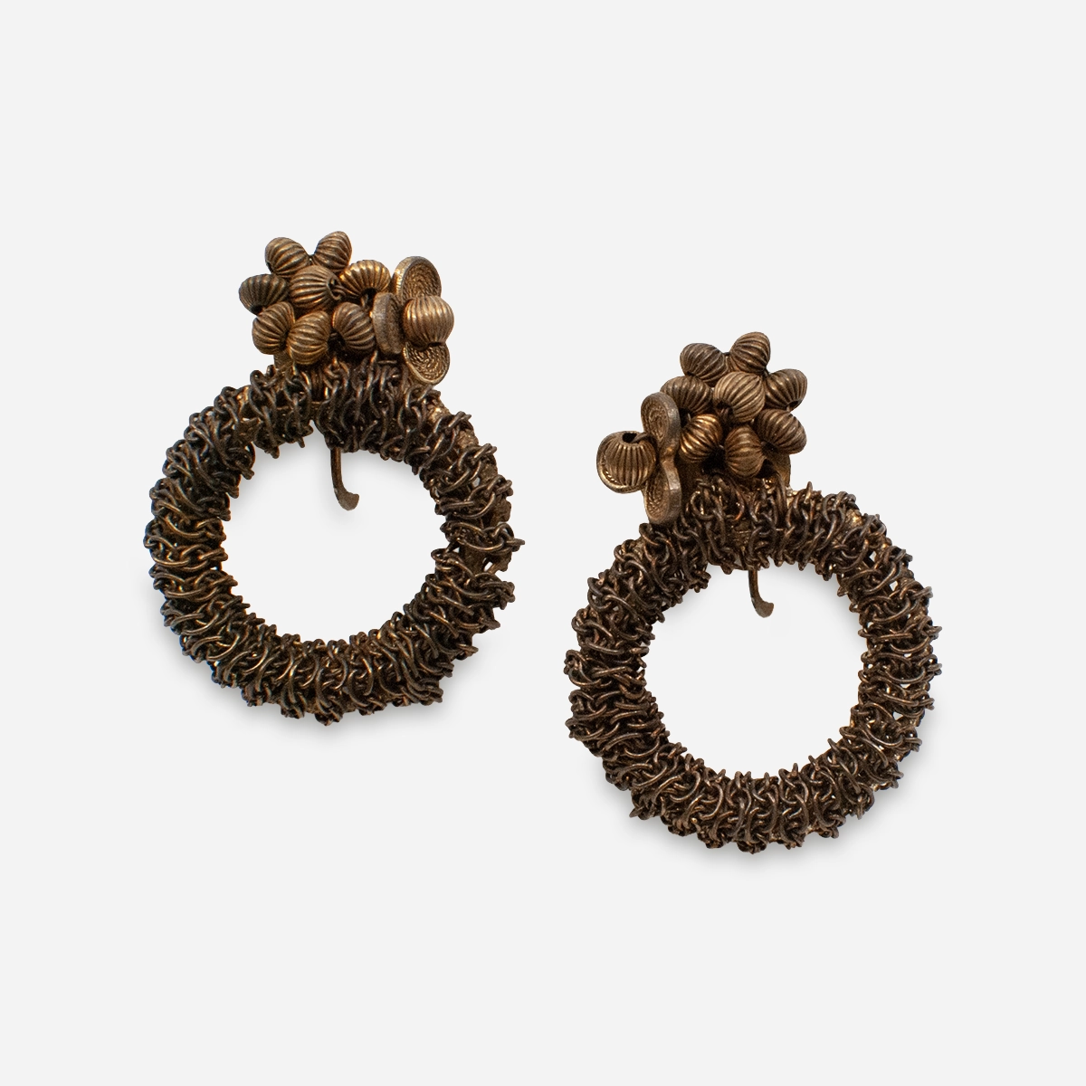 1950s Miriam Haskell brass clip earrings with floral tops and circular wire hoops