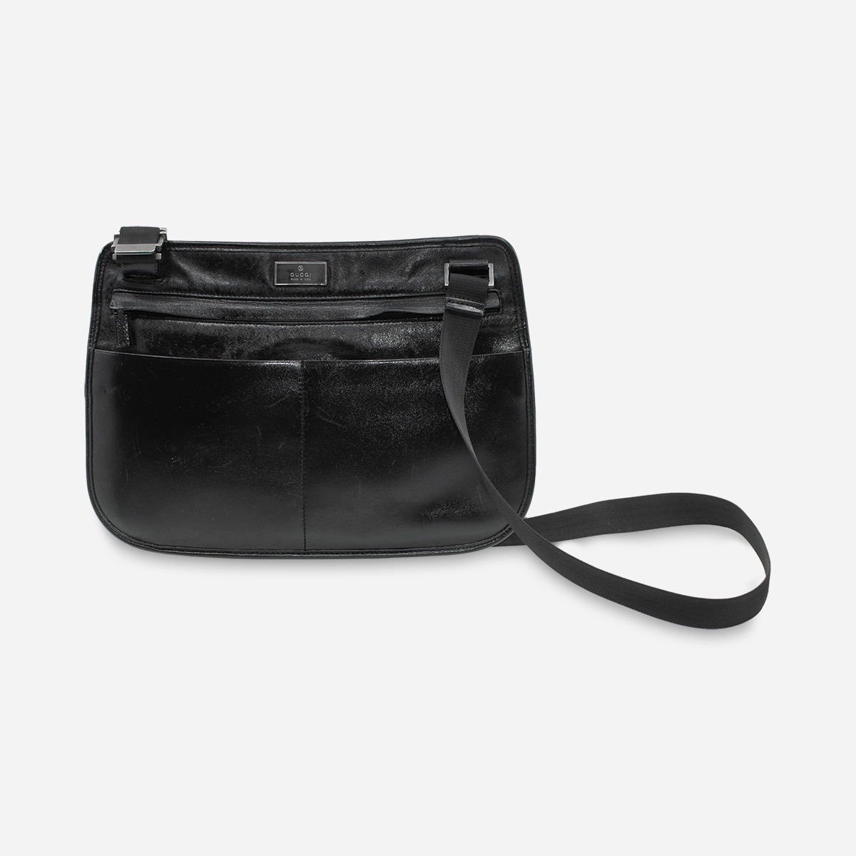Vintage Gucci black leather bag with exterior slip pockets.