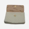 vintage whiting and davis handbag Interior of Whiting & Davis clutch with logo lining and gold metal rings