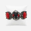 1950s figural blackamoor bracelet Close-up of Selini figural bracelet showing crowned resin heads and rhinestone accents.