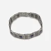 Antique edwardian sterling filgree bracelet Antique sterling silver filigree link bracelet by Simmons, top view.