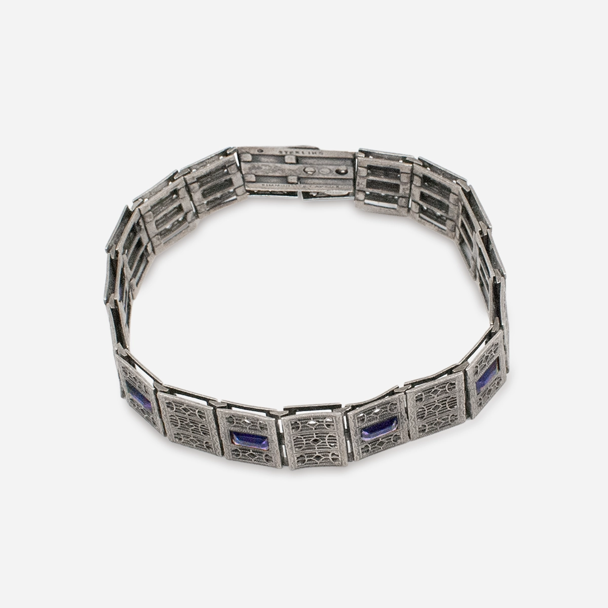 Antique sterling silver filigree link bracelet by Simmons, top view.