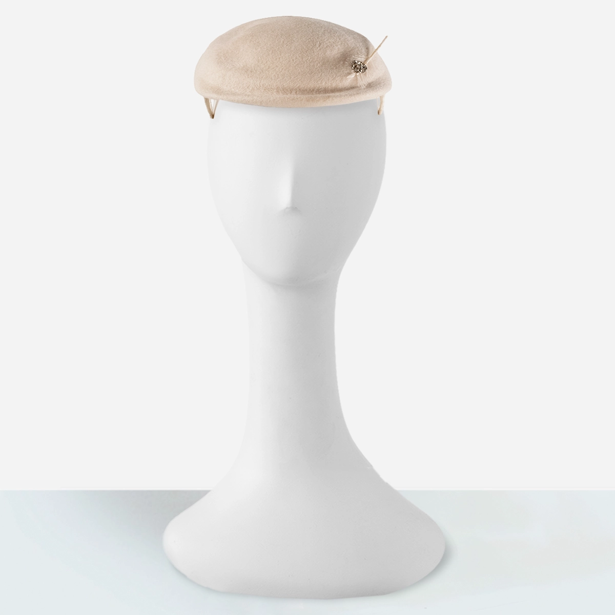 Front view of 1950s Clover Lane cream wool felt close hat