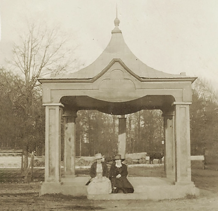 Madge seated with a colleague under a gazebo during her early years as a department store milliner, 1917. from Sod house to cloche