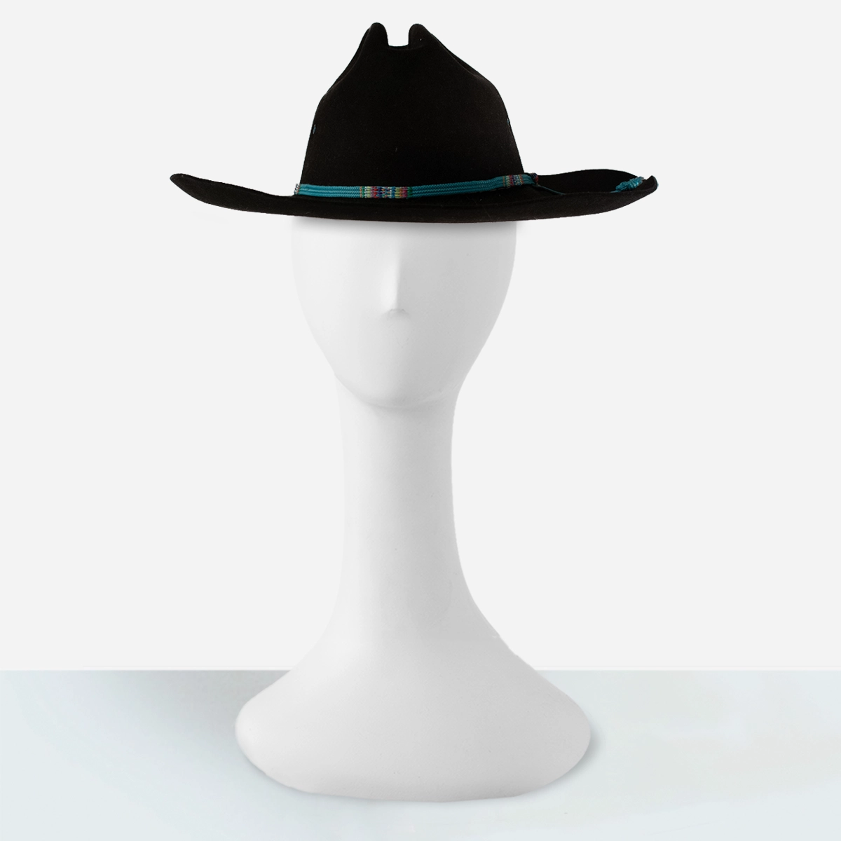 Front view of black Stetson cowboy hat on display stand.