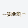 back of chanel bracelet Back view of Chanel openwork bracelet with gold tone finish.