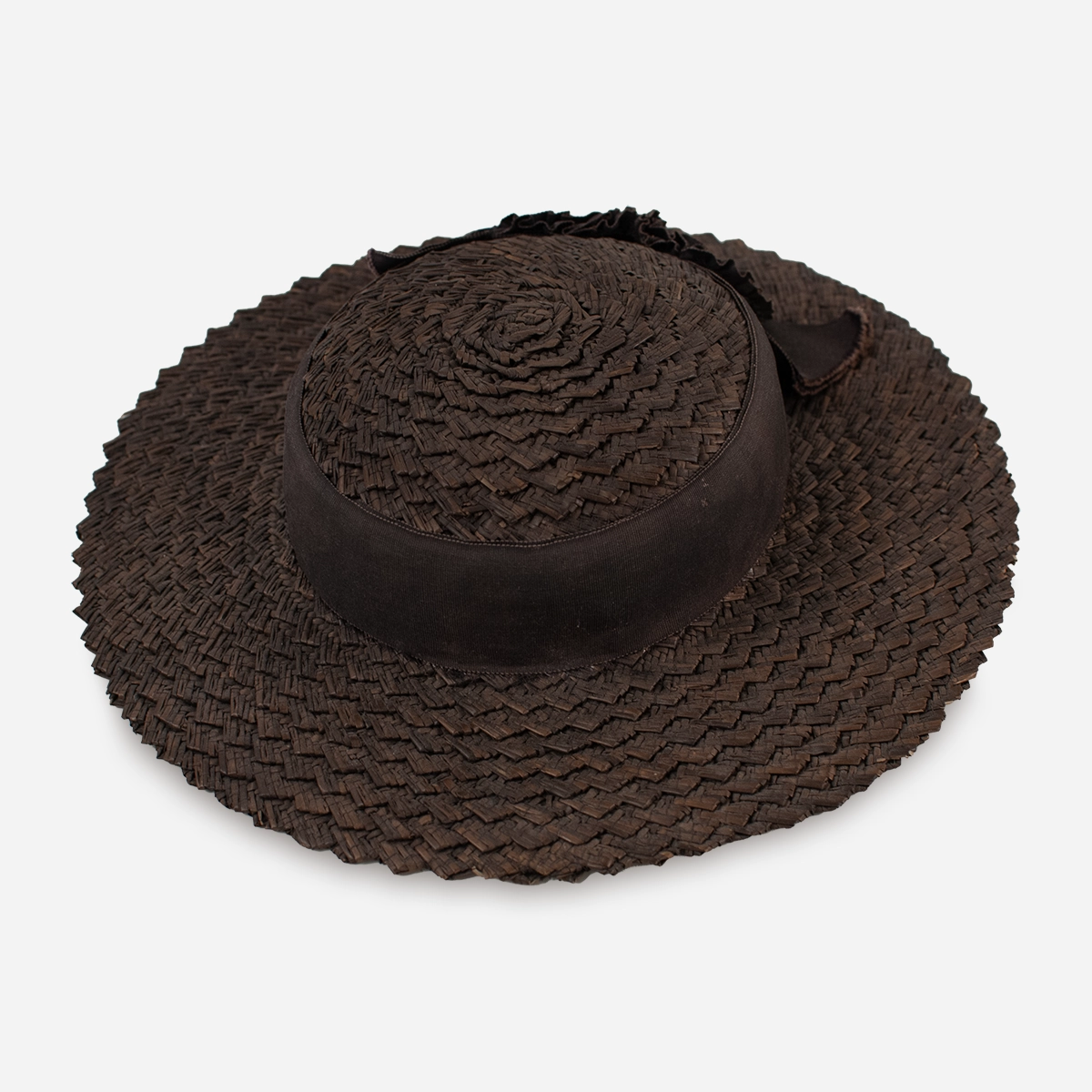 1930s brown plaited straw hat with wide brim and grosgrain ribbon trim.