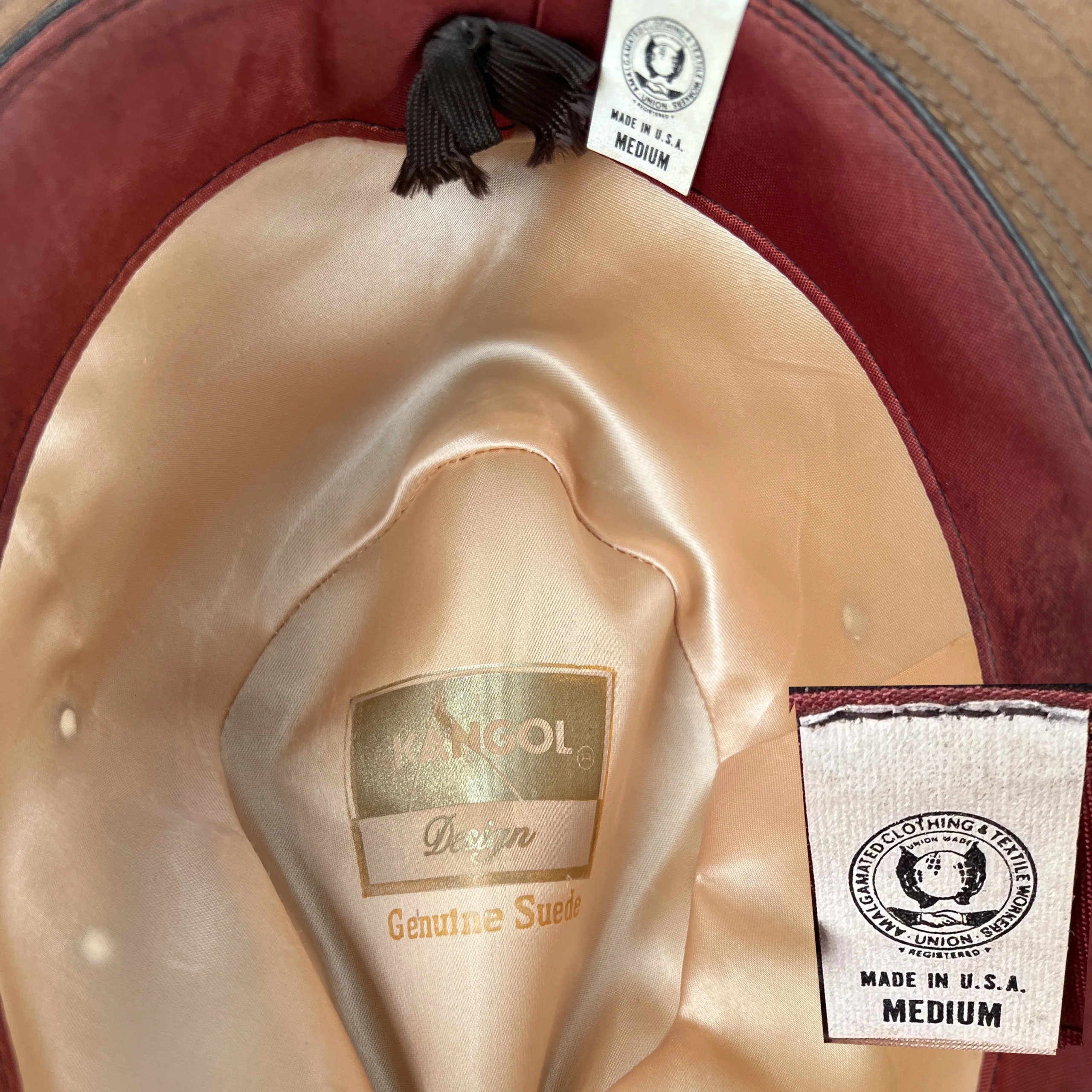 Interior of vintage Kangol trilby showing satin lining and stamp.