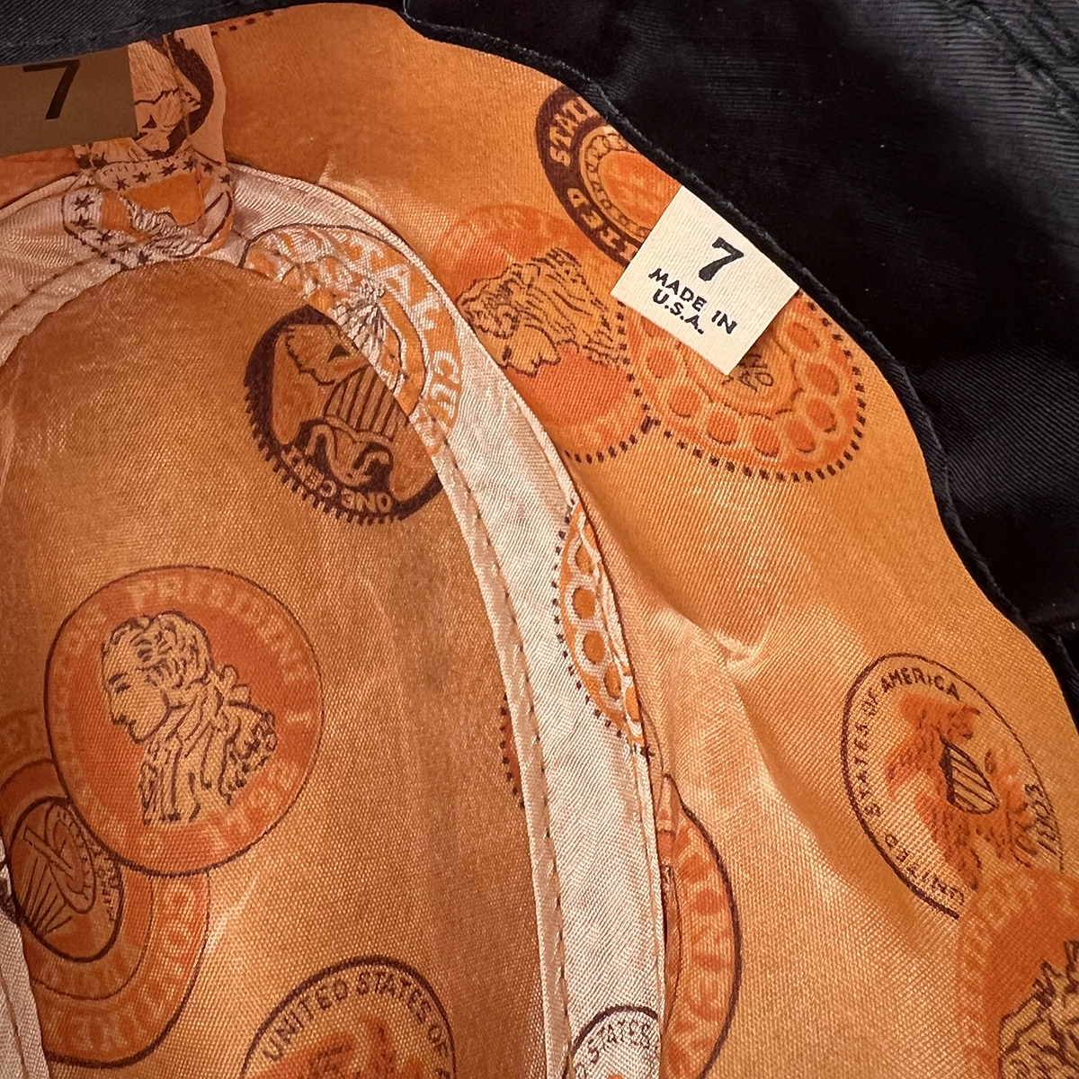 Close-up of size 7 Made in USA label inside vintage trilby hat