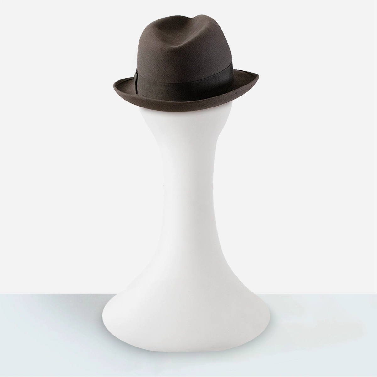 Vintage 1960s gray fedora Back view showing upturned brim of gray fur felt fedora.