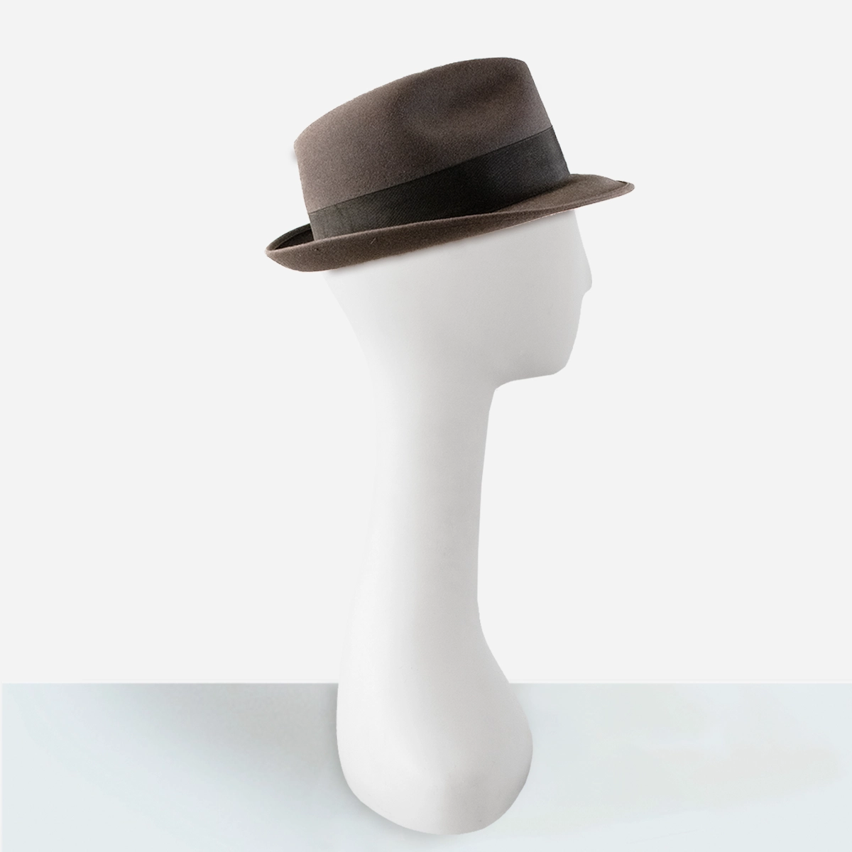 Vintage gray felt fedora Side view of vintage gray Creighton fedora with matching grosgrain ribbon.
