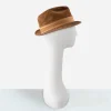 Side view of vintage brown suede trilby with upturned back brim.