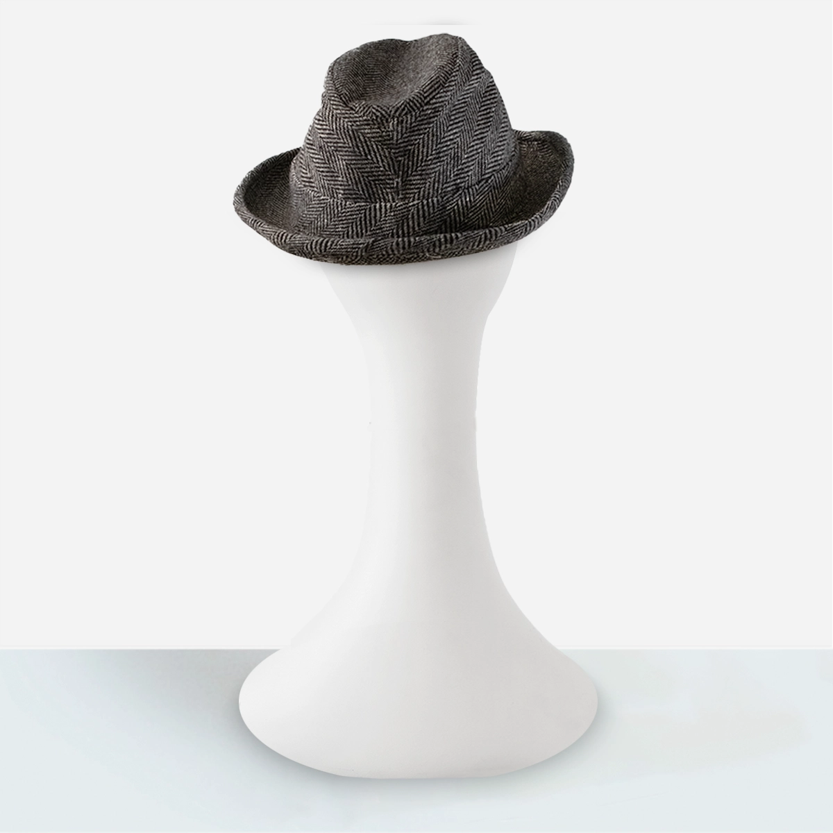 Back view of black herringbone trilby showing upturned back brim