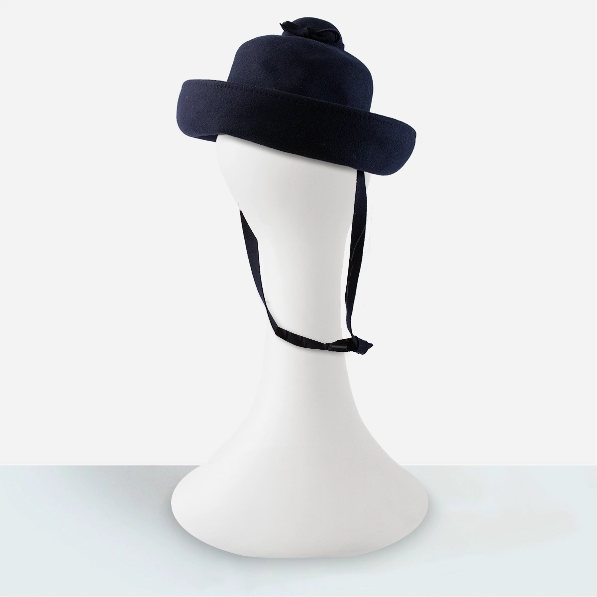 back view showing ribbon hatband and bow on Breton hat.